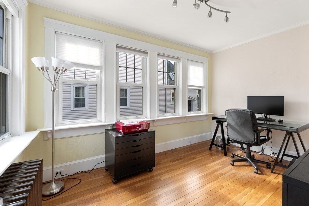 46 Downing Road Lexington, MA 02421 - Photo 4 of 29 a view of a workspace with furniture and a window
