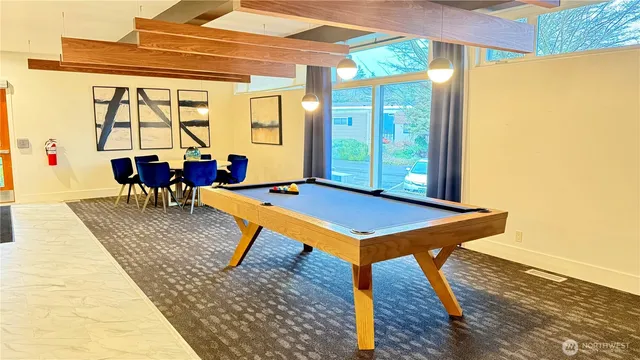 a living room with a table and a table