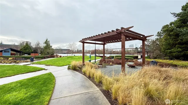 a view of a swimming pool and chairs in patio