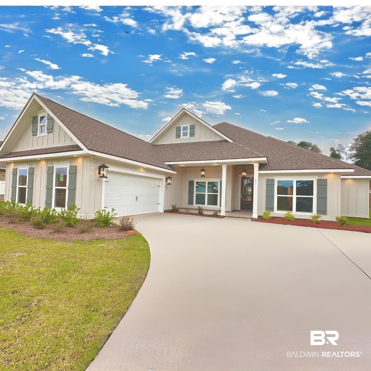 687 Kitfox Avenue Fairhope, AL 36532 - Photo 1 of 38 View of front of house featuring a garage and a front lawn
