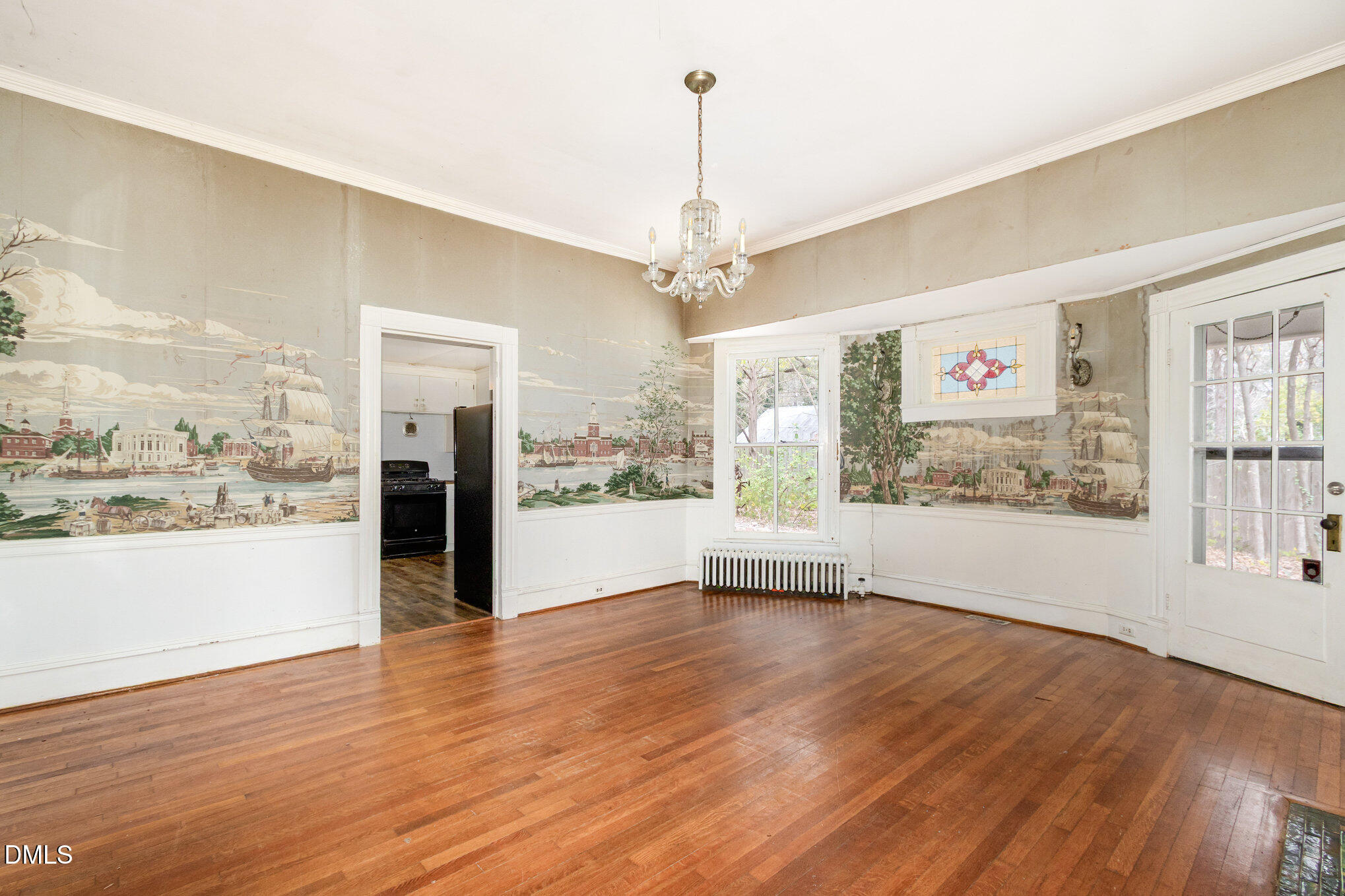 2636 Chapel Hill Road Durham, NC 27707 - Photo 11 of 35 a view of an empty room with a window and wooden floor