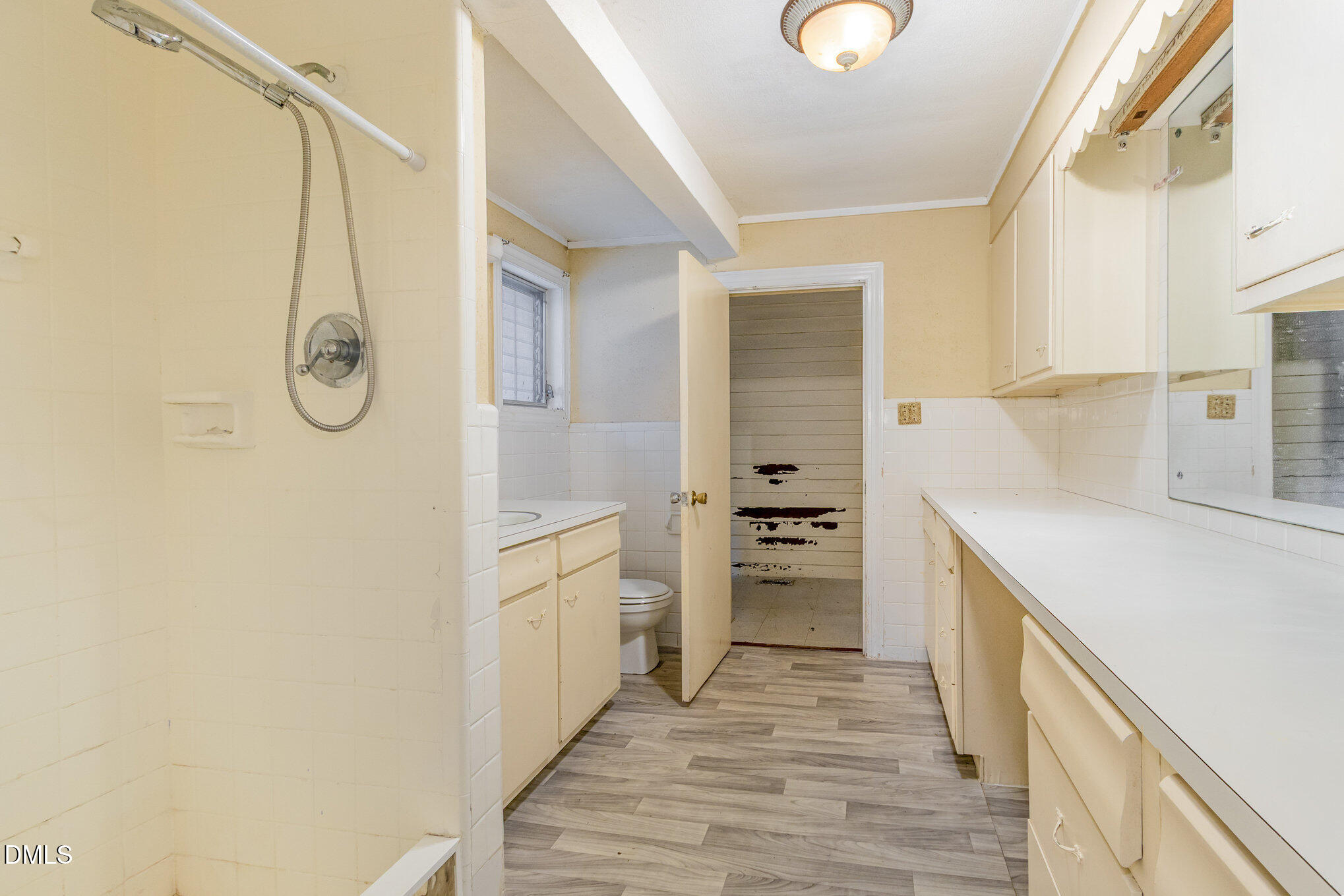 2636 Chapel Hill Road Durham, NC 27707 - Photo 19 of 35 a kitchen with cabinets and wooden floor