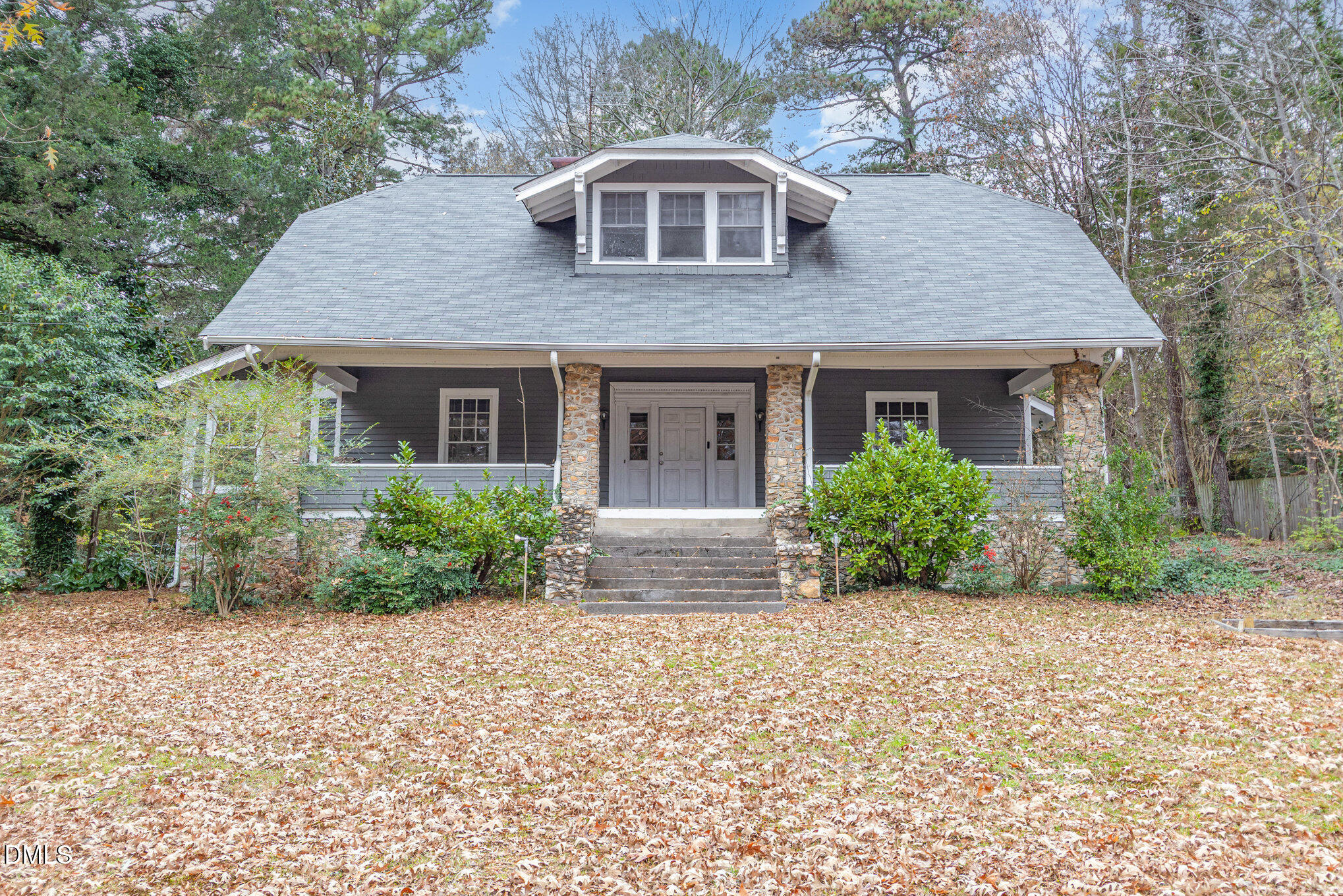 2636 Chapel Hill Road Durham, NC 27707 - Photo 28 of 35 a front view of house with yard and trees around