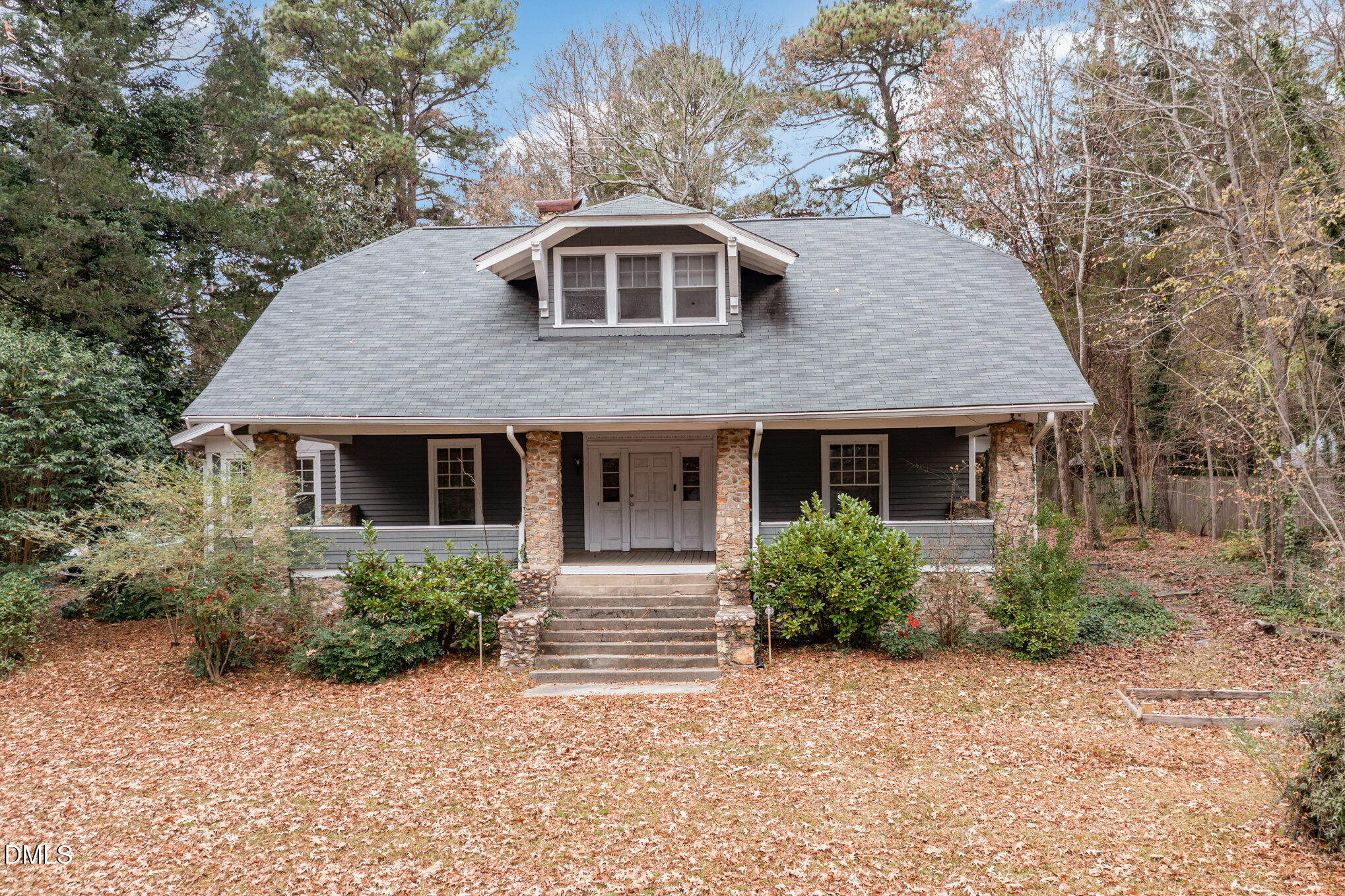 2636 Chapel Hill Road Durham, NC 27707 - Photo 29 of 35 a front view of house with yard and trees around