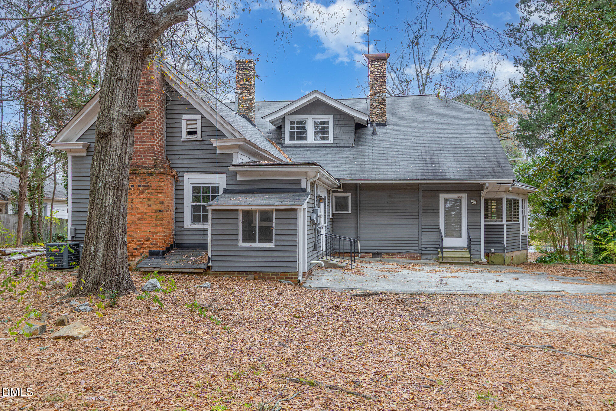 2636 Chapel Hill Road Durham, NC 27707 - Photo 4 of 35 a front view of a house with garden