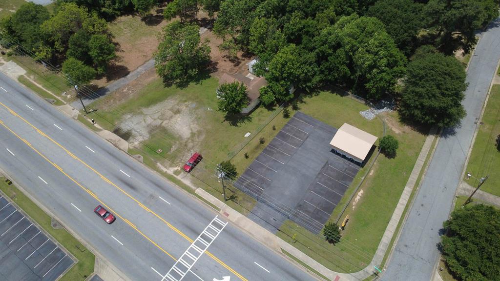 4935 Buena Vista Road Columbus, GA 31907 - Photo 17 of 24 an aerial view of a house a yard basket ball court and outdoor seating