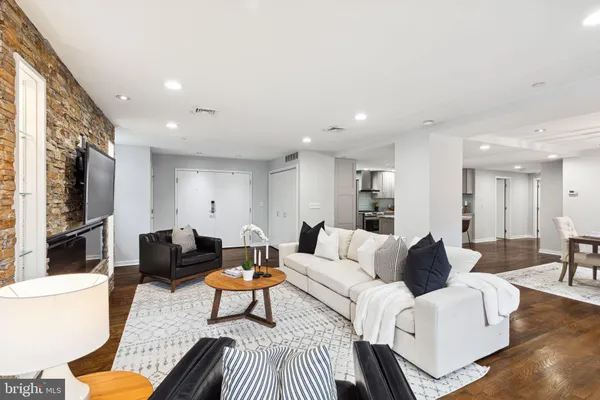 a living room with furniture and a couch