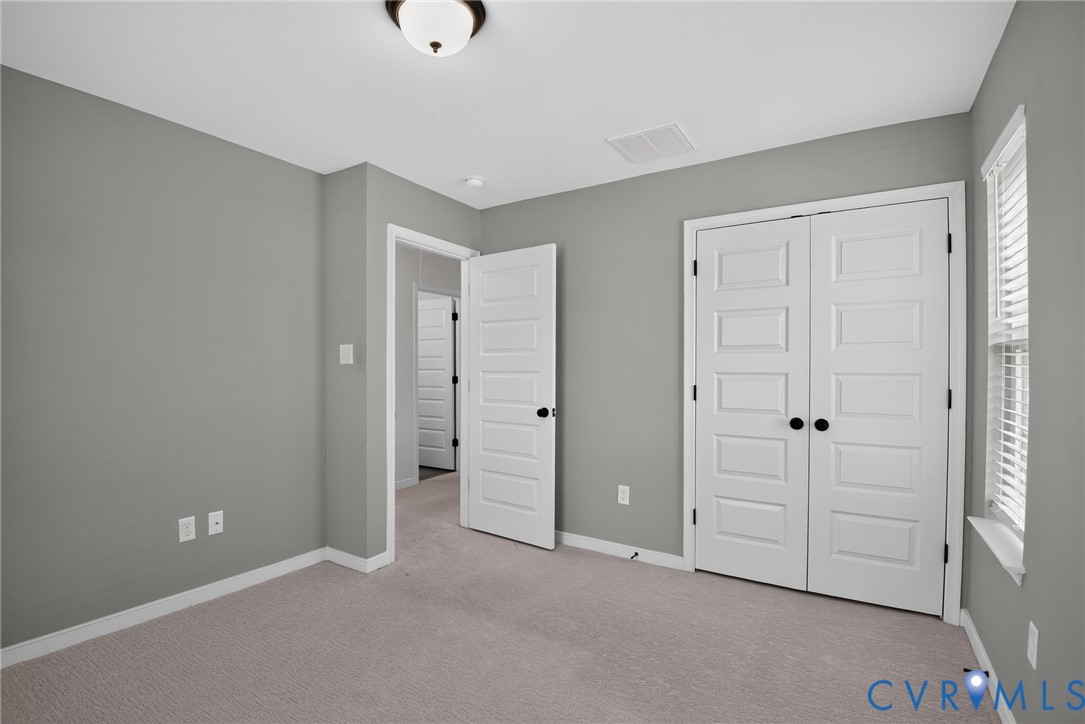 7825 Old Guild Road Richmond, VA 23237 - Photo 28 of 35 Carpeted room featuring light gray wall paint, whi