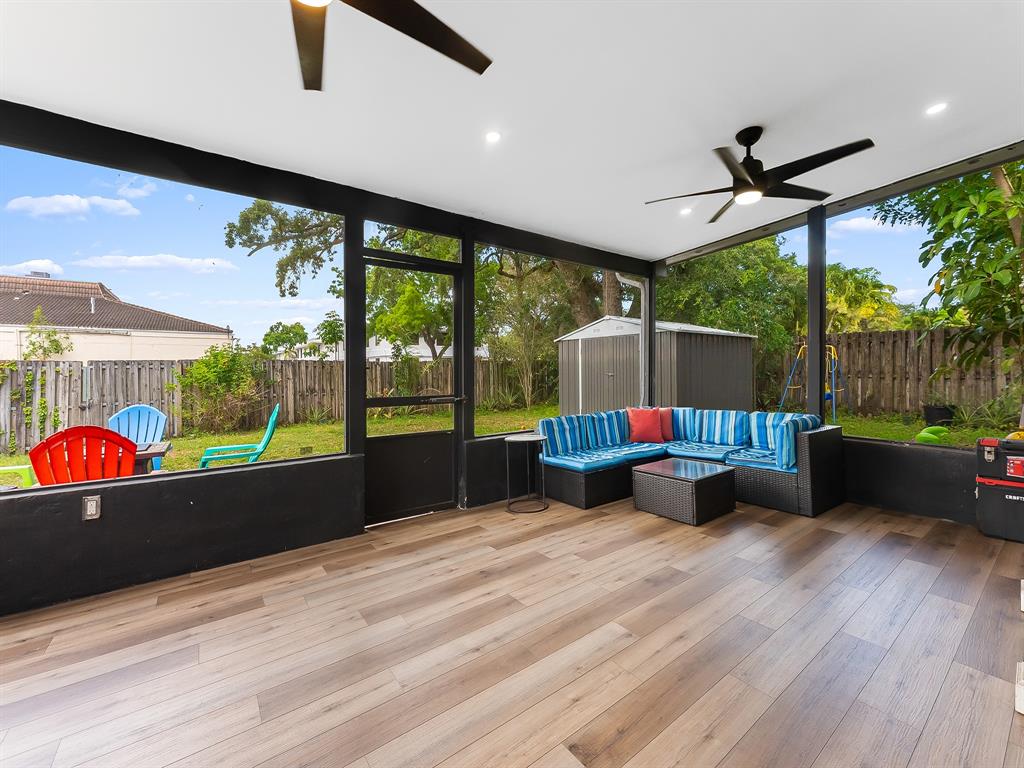 4411 Thomas Street Hollywood, FL 33021 - Photo 18 of 21 a view of two chairs in the balcony
