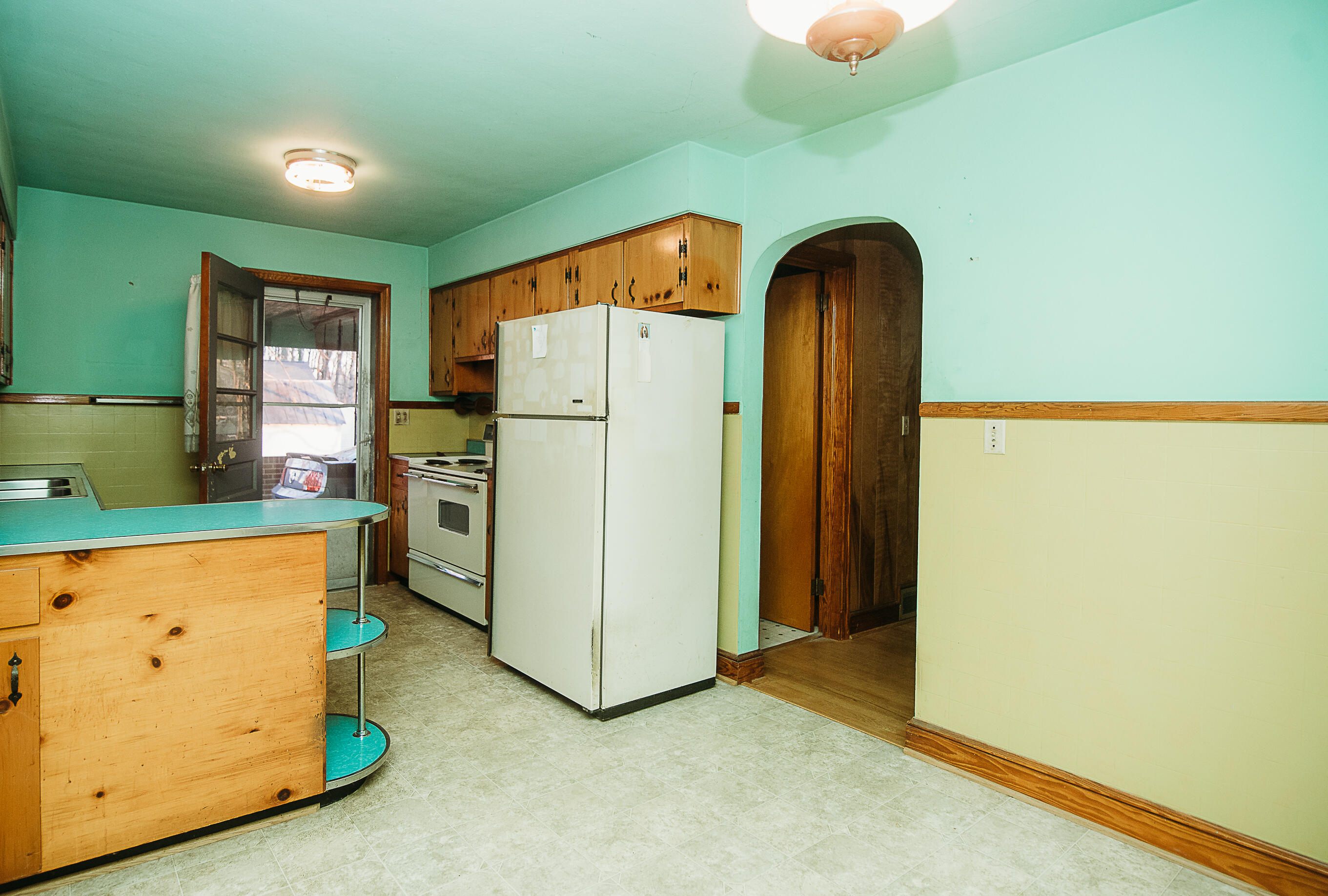 925 Scuffling Hill Road Rocky Mount, VA 24151 - Photo 11 of 12 a kitchen with refrigerator and window