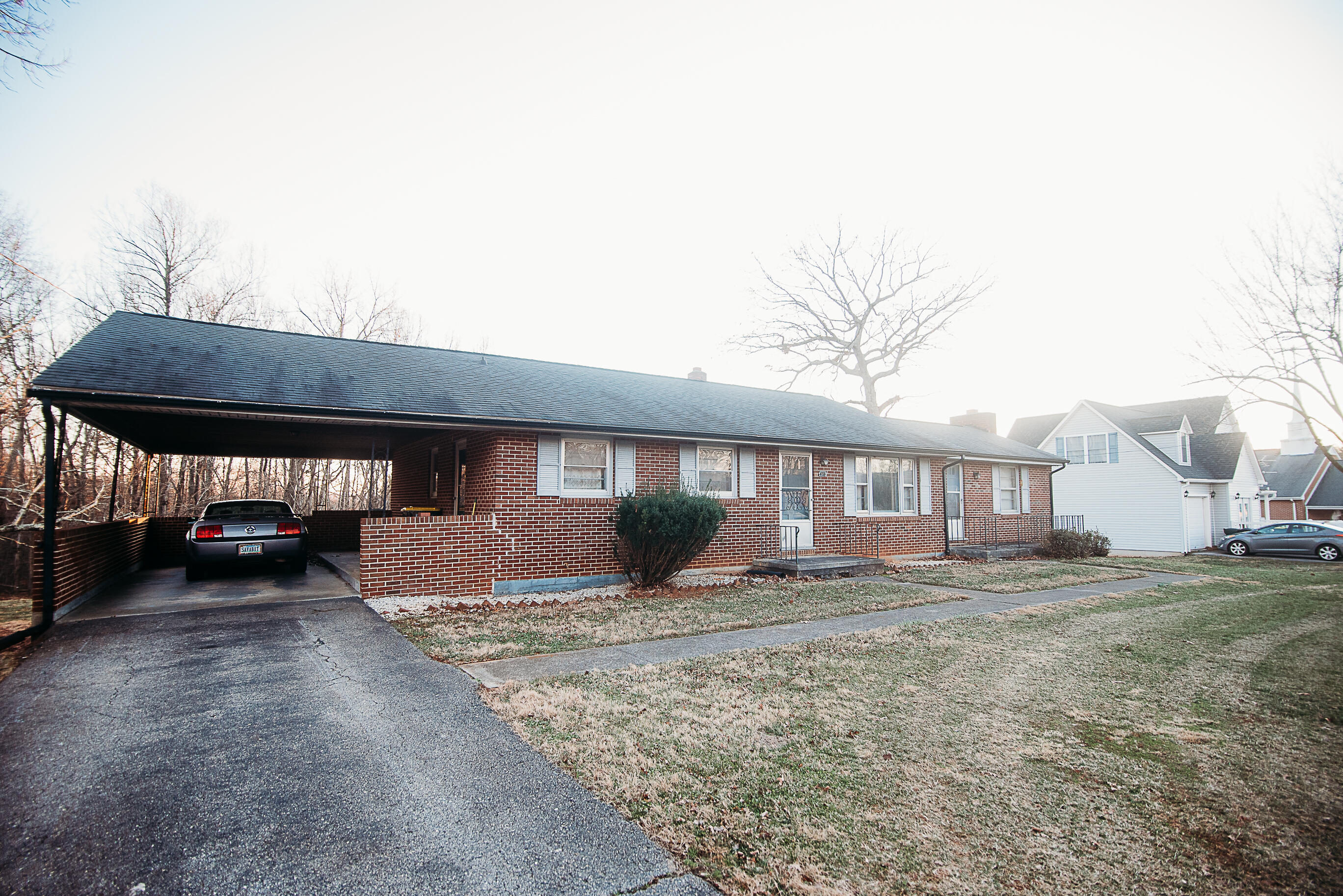925 Scuffling Hill Road Rocky Mount, VA 24151 - Photo 3 of 12 a view of a house with a yard
