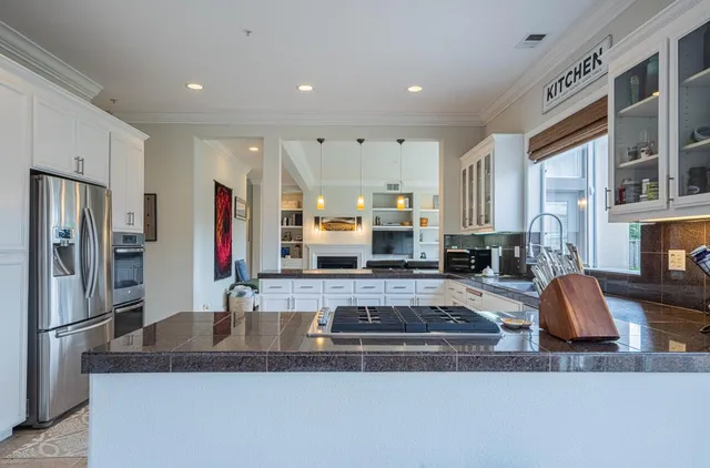 a workspace with furniture and a window