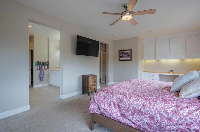 a room with furniture a bed and a window