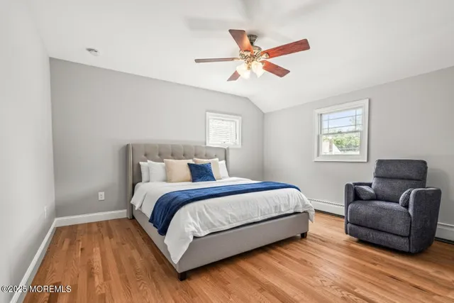 a bed room with a bed and a couch