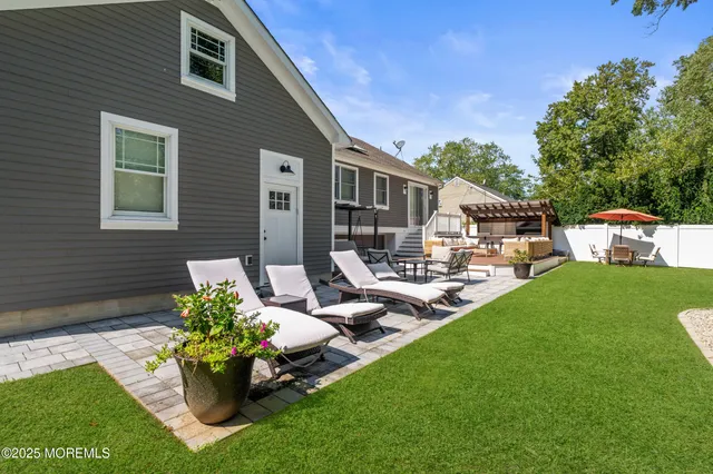 a front view of a house with patio