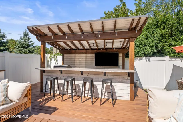 a view of a chairs and table in the patio