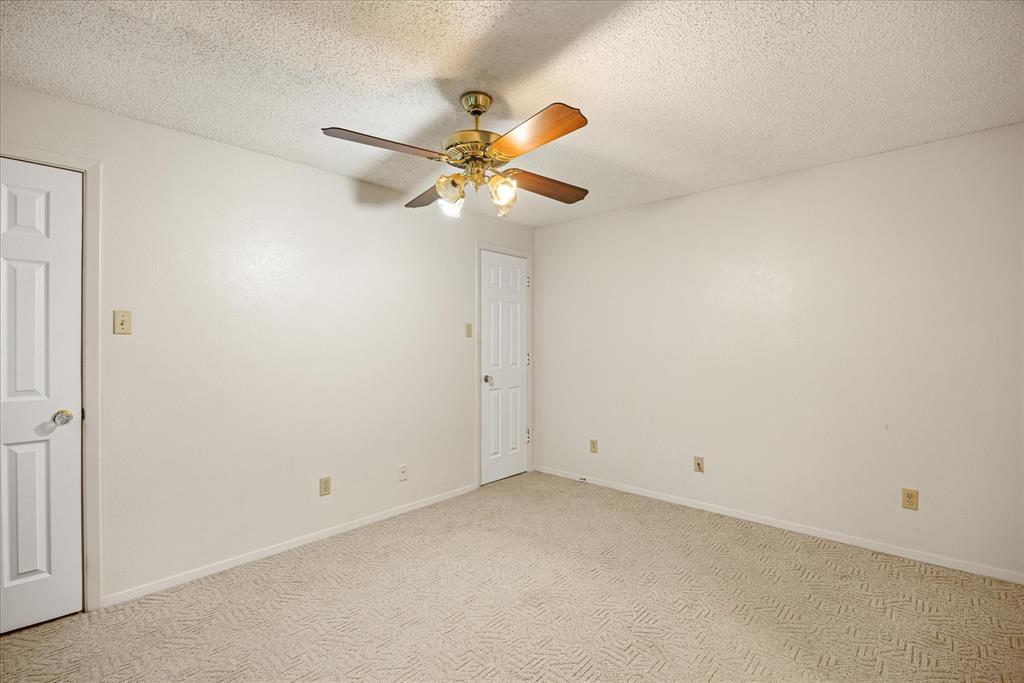 246 Comanche Trail Weatherford, TX 76087 - Photo 11 of 37 a view of a small space with a fan