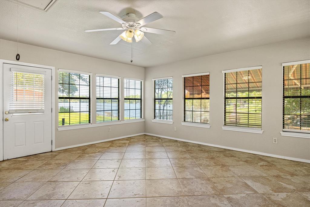246 Comanche Trail Weatherford, TX 76087 - Photo 19 of 37 a view of an empty room with a window