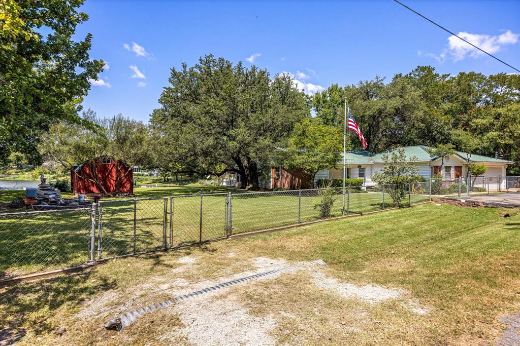 246 Comanche Trail Weatherford, TX 76087 - Photo 23 of 37 a view of street with houses
