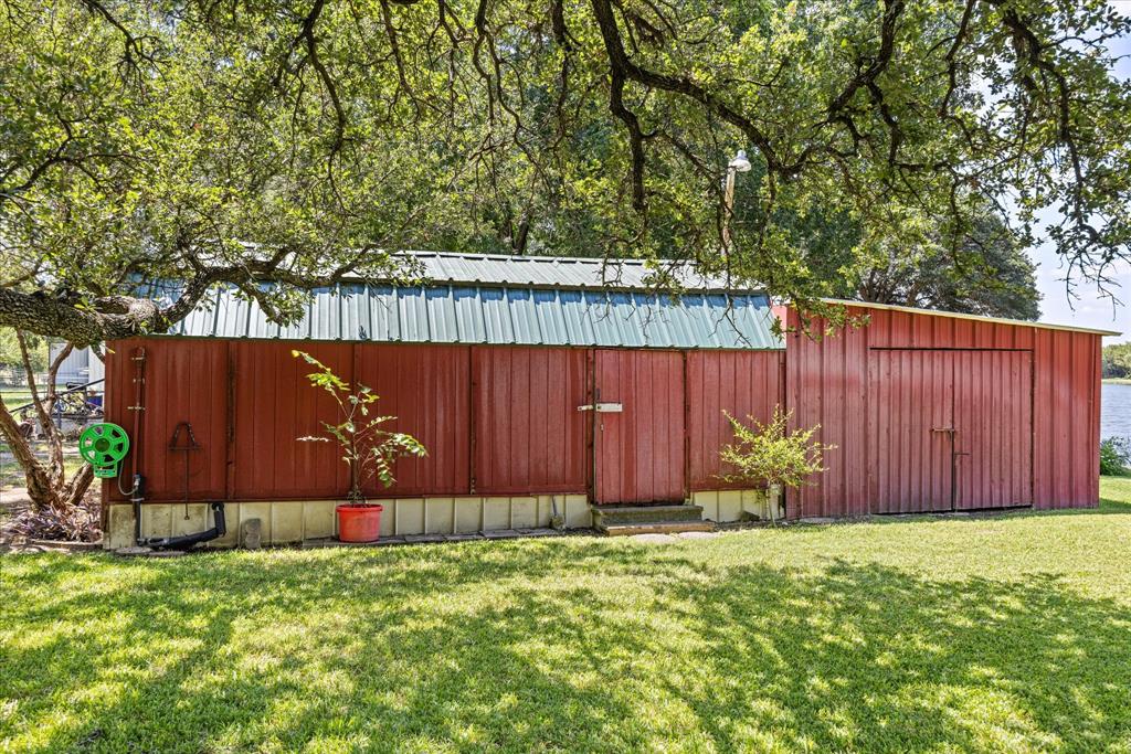 246 Comanche Trail Weatherford, TX 76087 - Photo 26 of 37 a view of garden with wooden fence