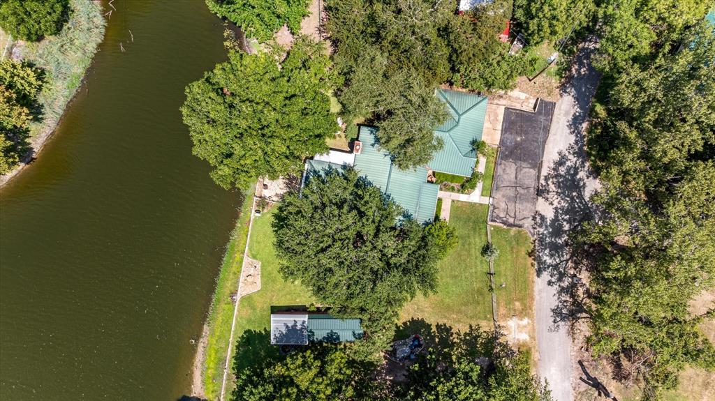 246 Comanche Trail Weatherford, TX 76087 - Photo 34 of 37 an aerial view of a house with a yard