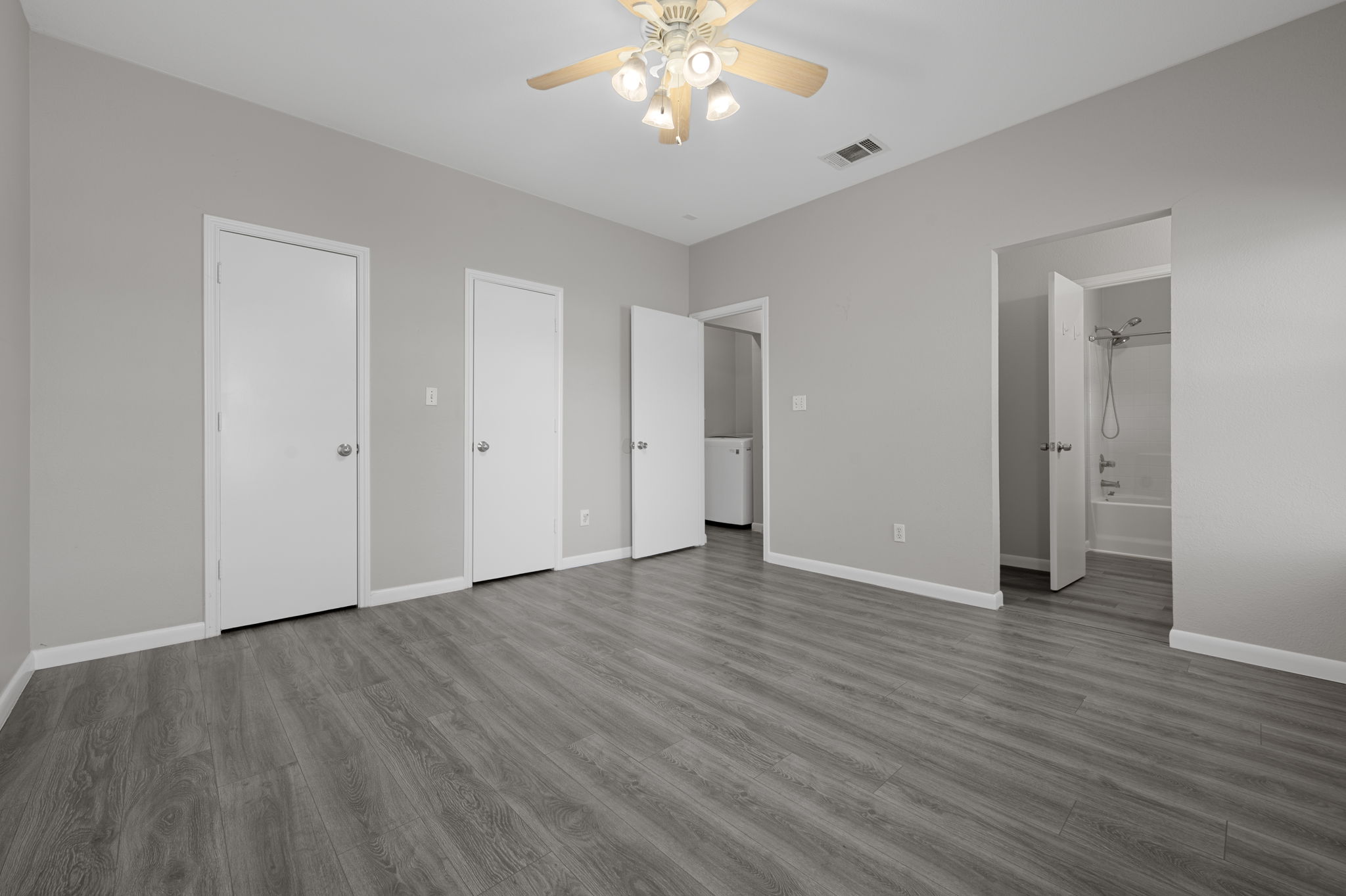 106 Shenandoah Trail Elgin, TX 78621 - Photo 16 of 26 a view of an empty room with wooden floor