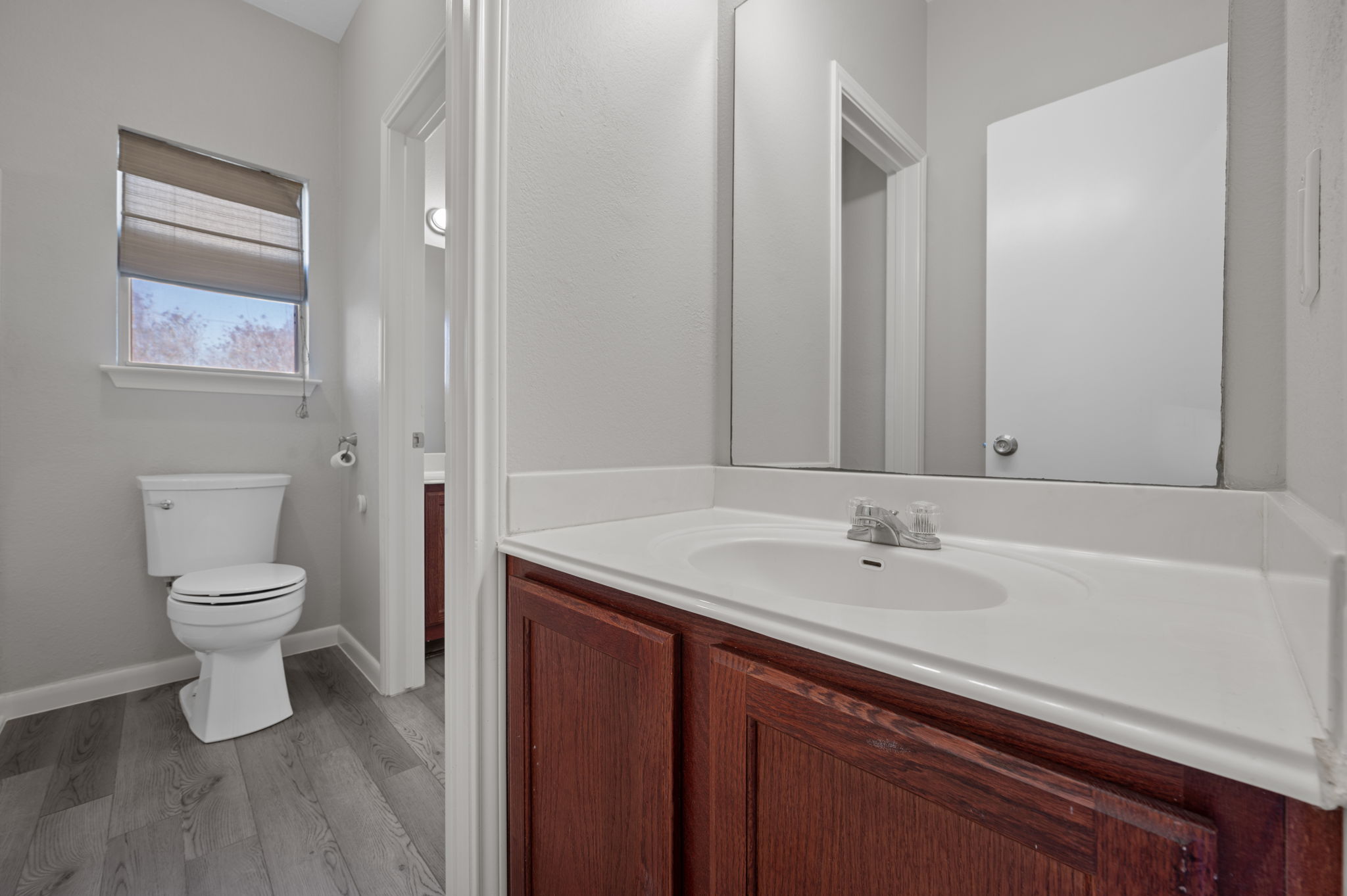 106 Shenandoah Trail Elgin, TX 78621 - Photo 18 of 26 a bathroom with a sink a toilet and shower