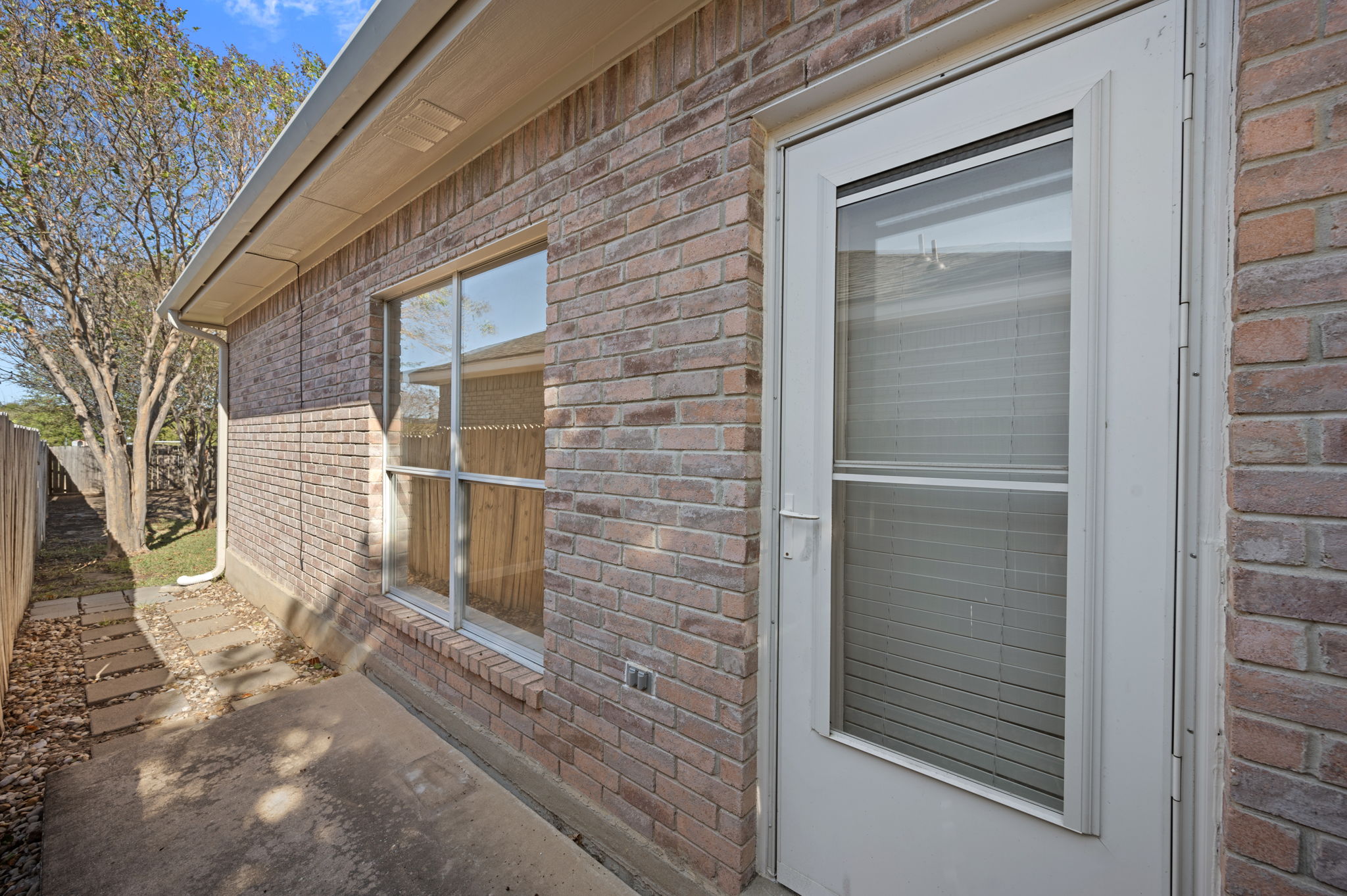 106 Shenandoah Trail Elgin, TX 78621 - Photo 22 of 26 a view of front door of house