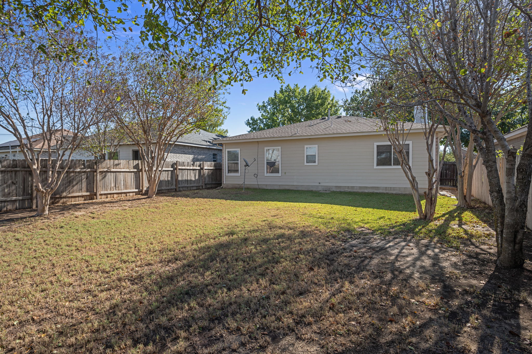 106 Shenandoah Trail Elgin, TX 78621 - Photo 24 of 26 a view of a house with a yard