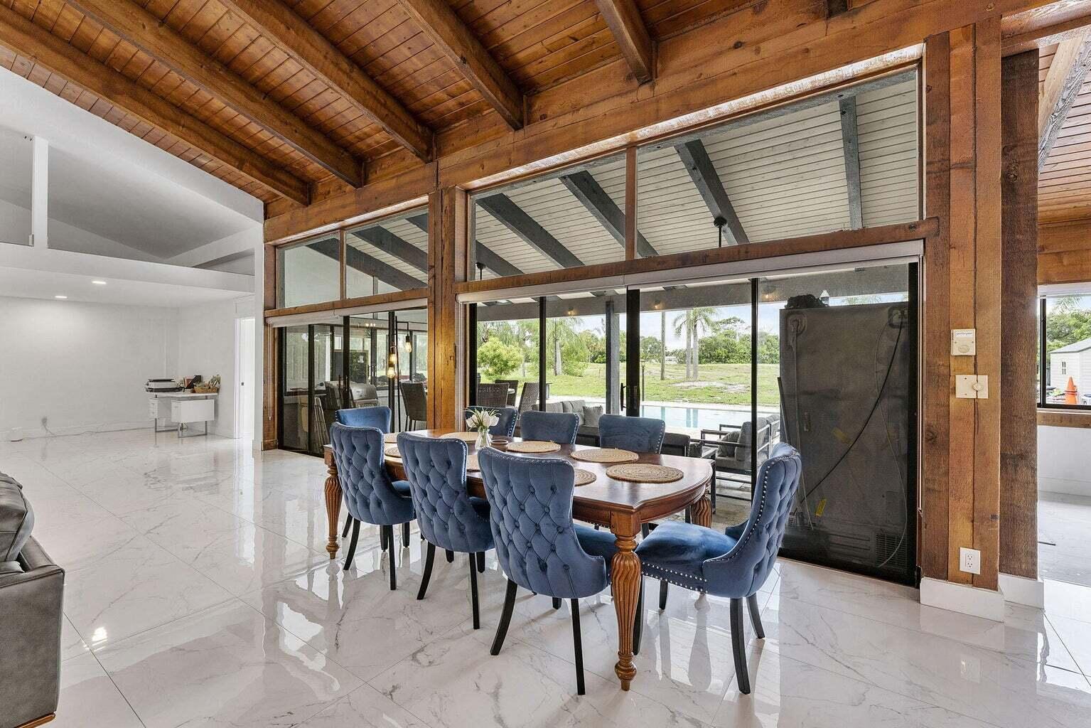 6031 Northwest 4th Avenue Boca Raton, FL 33487 - Photo 10 of 36 a view of a dining room with furniture window and outside view