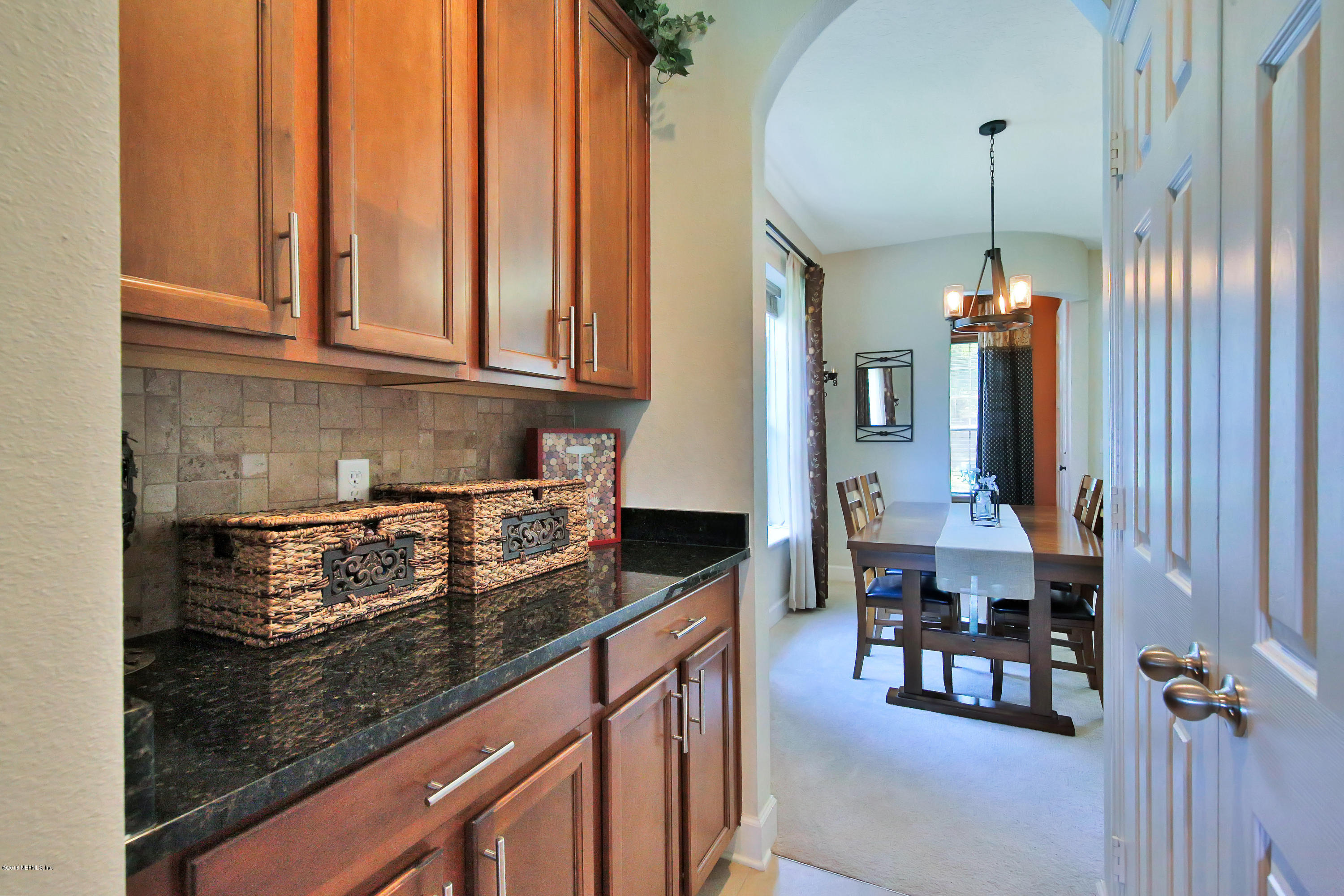 214 North Saxxon Road St. Augustine, FL 32092 - Photo 18 of 36 a kitchen with large window