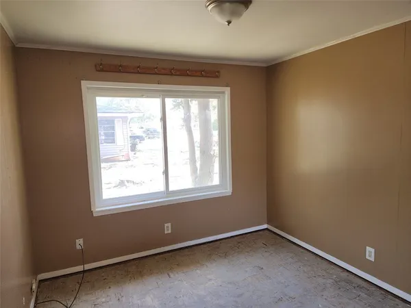 an empty room with a window