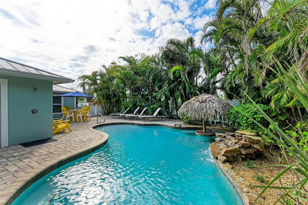 308 58th Street, Unit A Holmes Beach, FL 34217 - Photo 32 of 41 a view of a house with swimming pool
