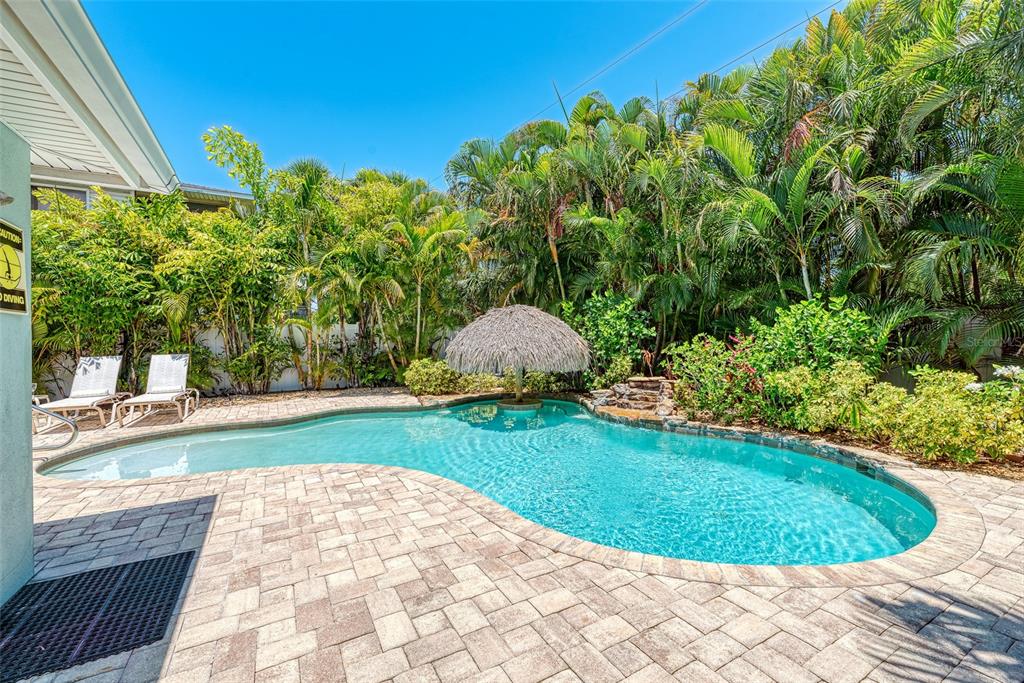 308 58th Street, Unit A Holmes Beach, FL 34217 - Photo 33 of 41 a view of a back yard