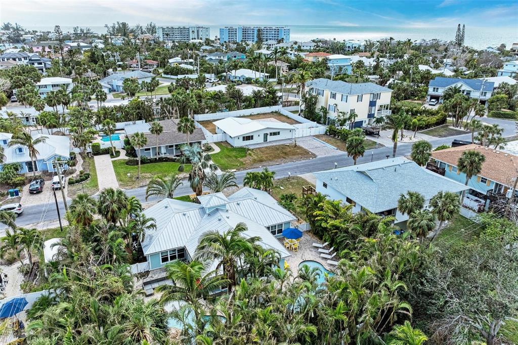 308 58th Street, Unit A Holmes Beach, FL 34217 - Photo 35 of 41 an aerial view of residential houses with outdoor space