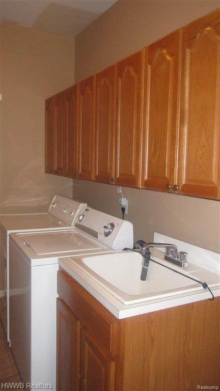 10321 Durham Road Clarkston, MI 48348 - Photo 10 of 23 First floor laundry