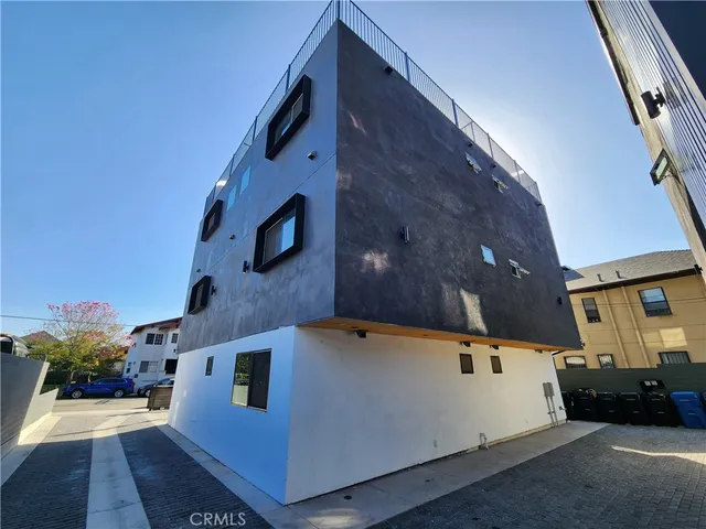 a view of a street with sitting area
