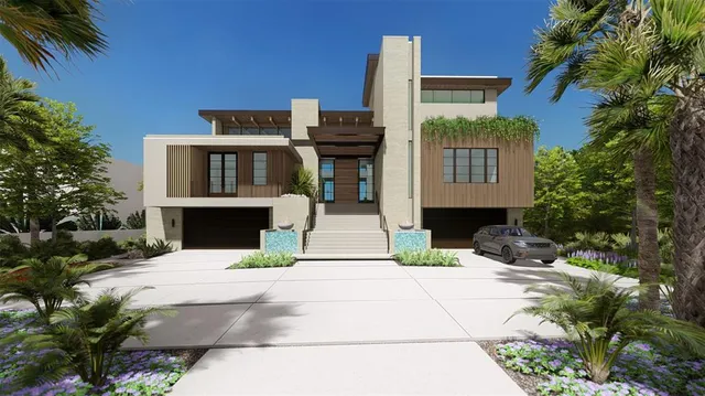 a view of a house with potted plants and a large tree