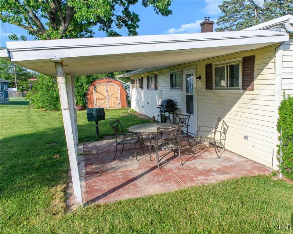 25 Saylor Drive Coplay, PA 18037 - Photo 14 of 20 a view of a chair and table in patio with a yard