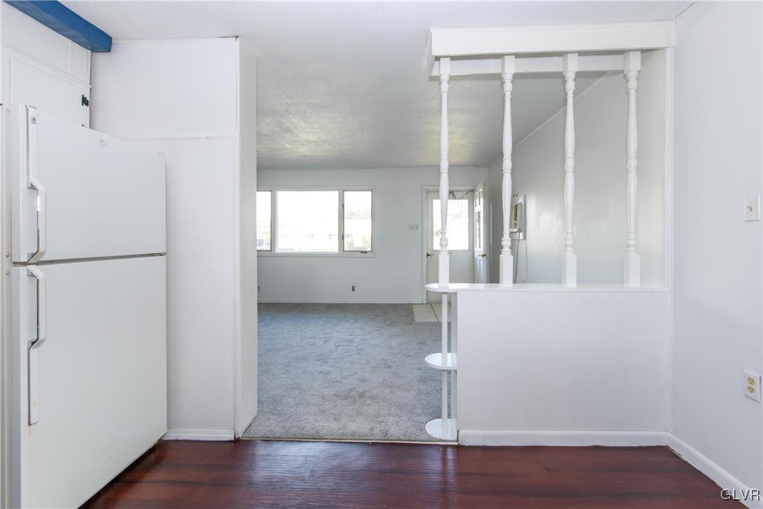25 Saylor Drive Coplay, PA 18037 - Photo 6 of 20 a view of a room with wooden floor and windows