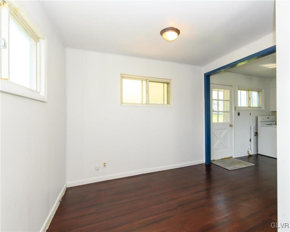 25 Saylor Drive Coplay, PA 18037 - Photo 9 of 20 an empty room with wooden floor and windows