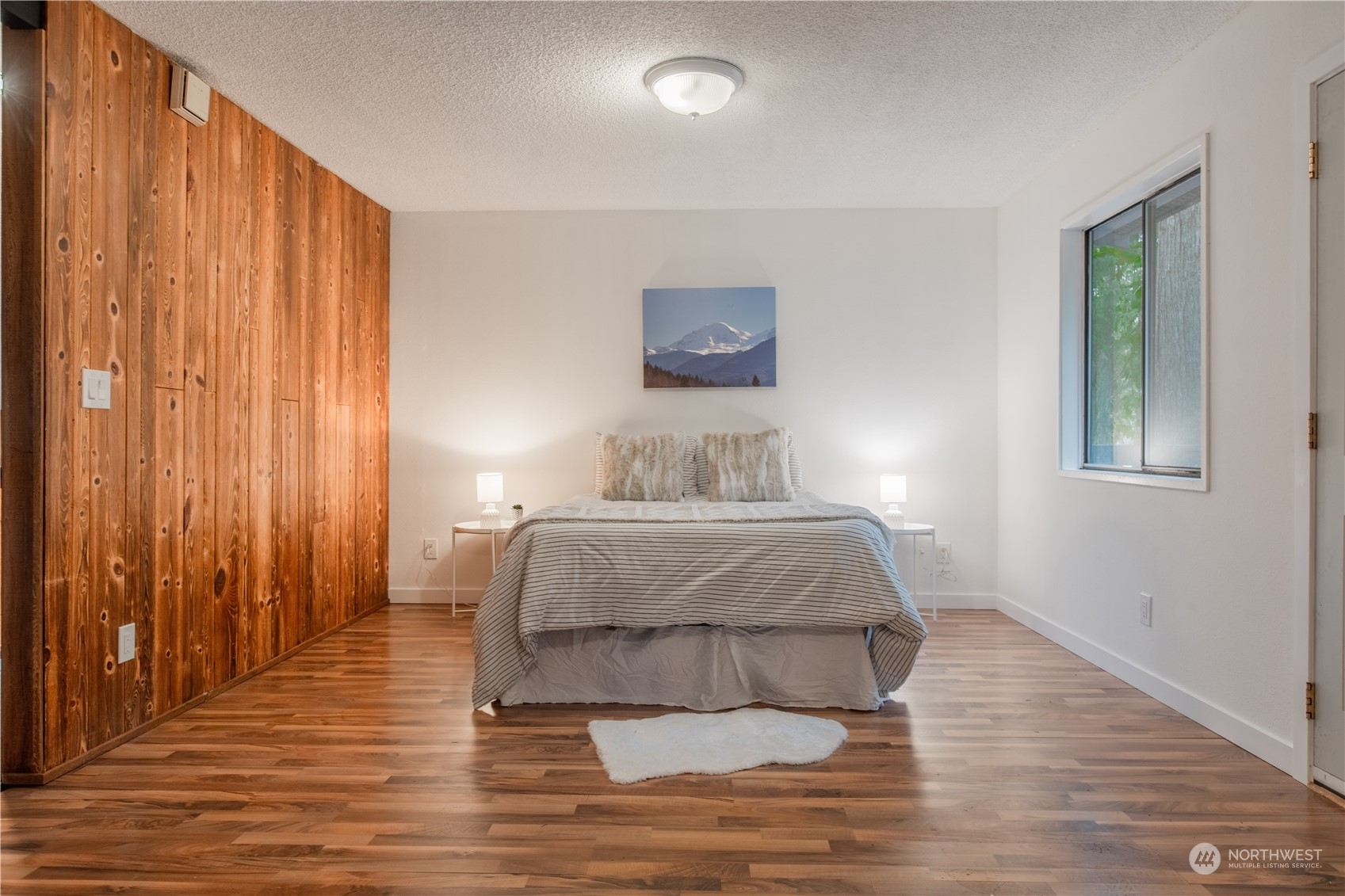 7736 View Ridge Drive Maple Falls, WA 98266 - Photo 14 of 25 a bedroom with a bed and a window