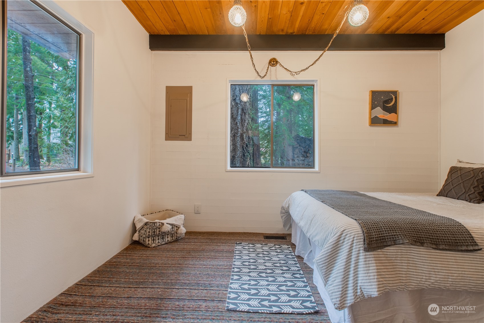 7736 View Ridge Drive Maple Falls, WA 98266 - Photo 19 of 25 a bedroom with a bed and a window
