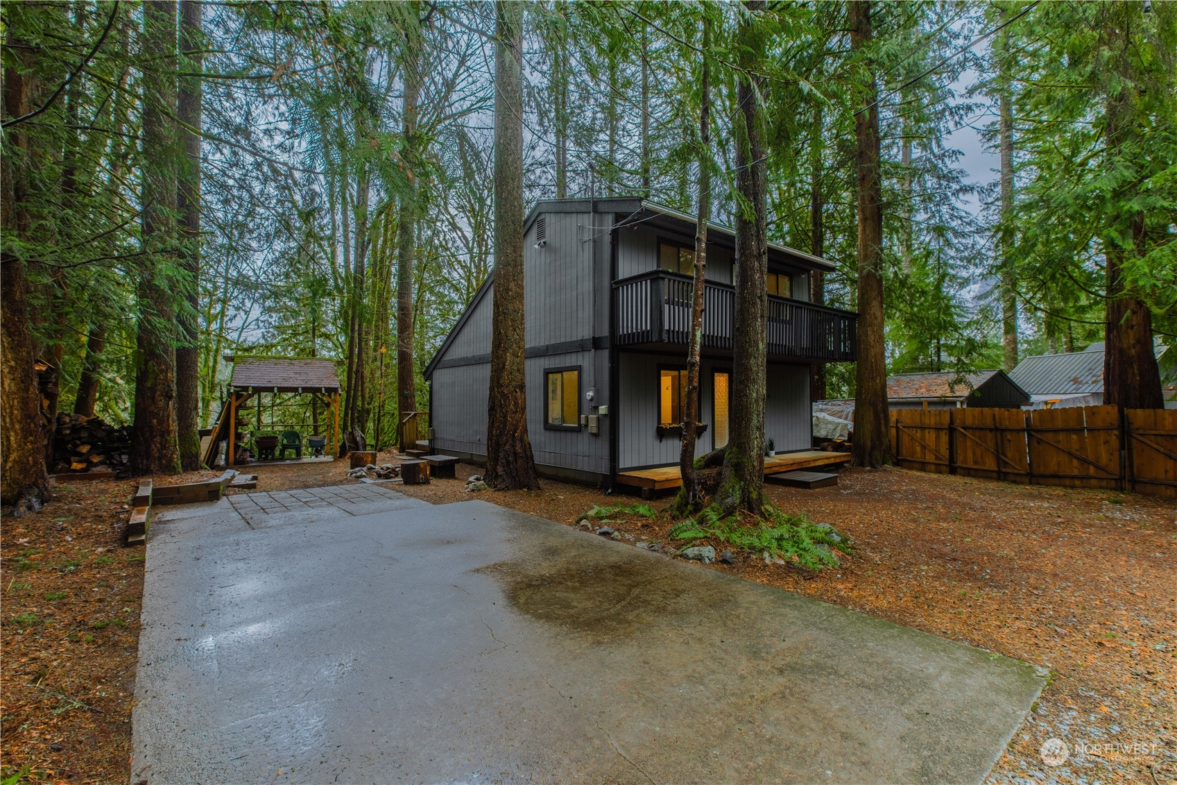 7736 View Ridge Drive Maple Falls, WA 98266 - Photo 22 of 25 a view of a house with backyard and trees