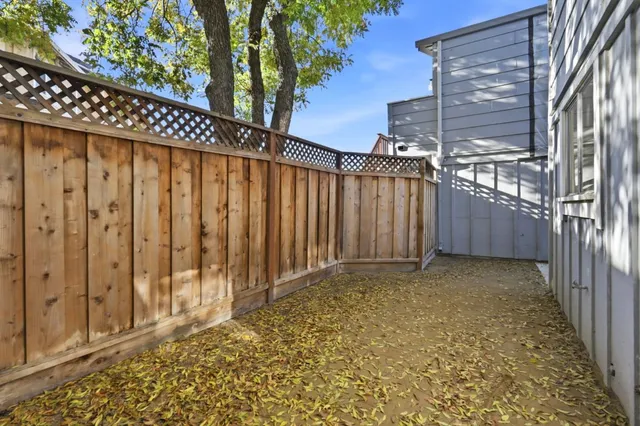 a view of a house with a tree