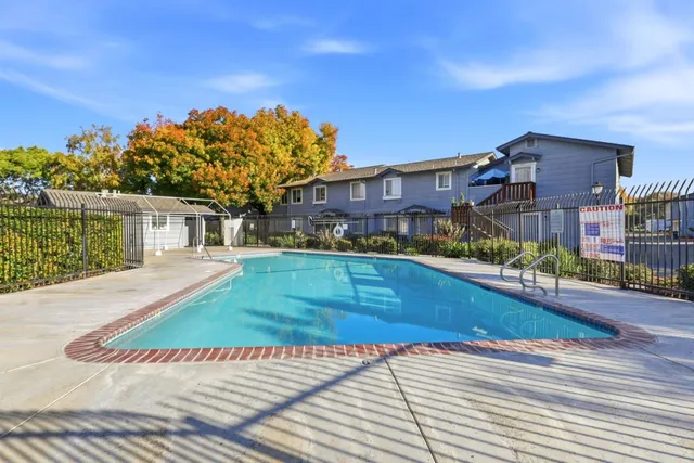 a front view of a house with garage