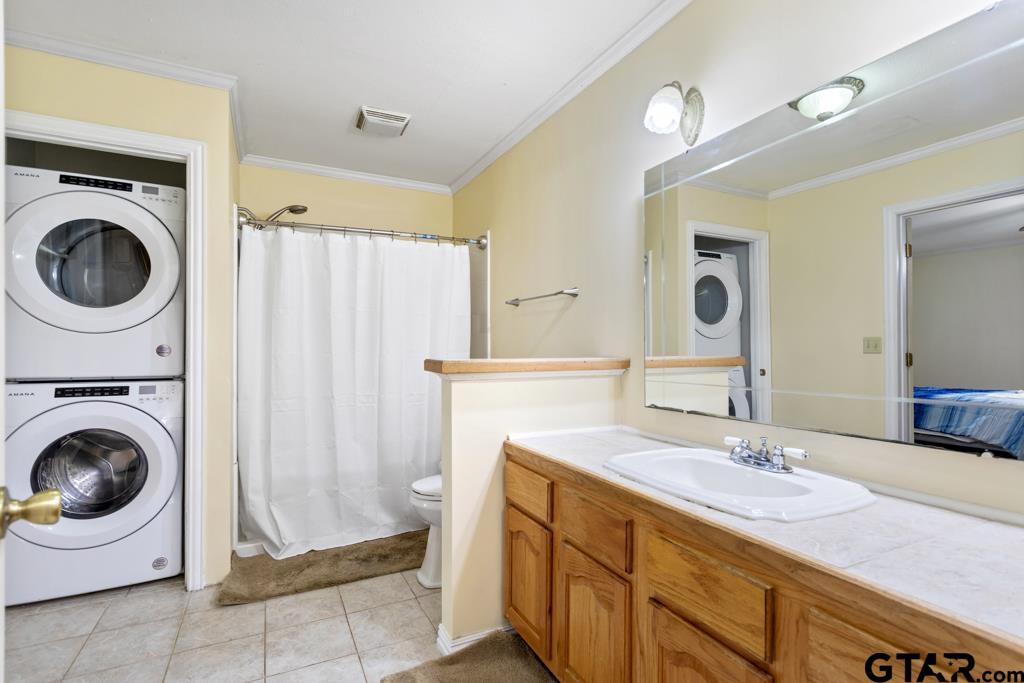 448 North Hill Road Tyler, TX 75706 - Photo 19 of 30 a spacious bathroom with a sink a mirror and a shower