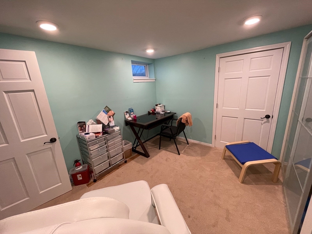 31 Hunnewell Street, Unit 31 Needham, MA 02494 - Photo 18 of 21 a living room with furniture