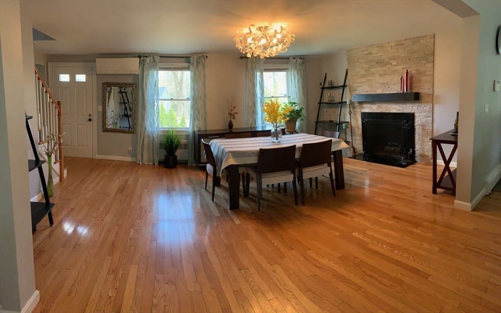 31 Hunnewell Street, Unit 31 Needham, MA 02494 - Photo 7 of 21 a view of a dining room with furniture window and wooden floor