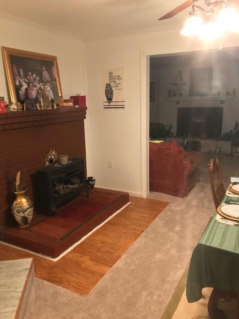 6833 North Pinson Road Portland, TN 37148 - Photo 6 of 18 a bedroom with a bed and a fireplace